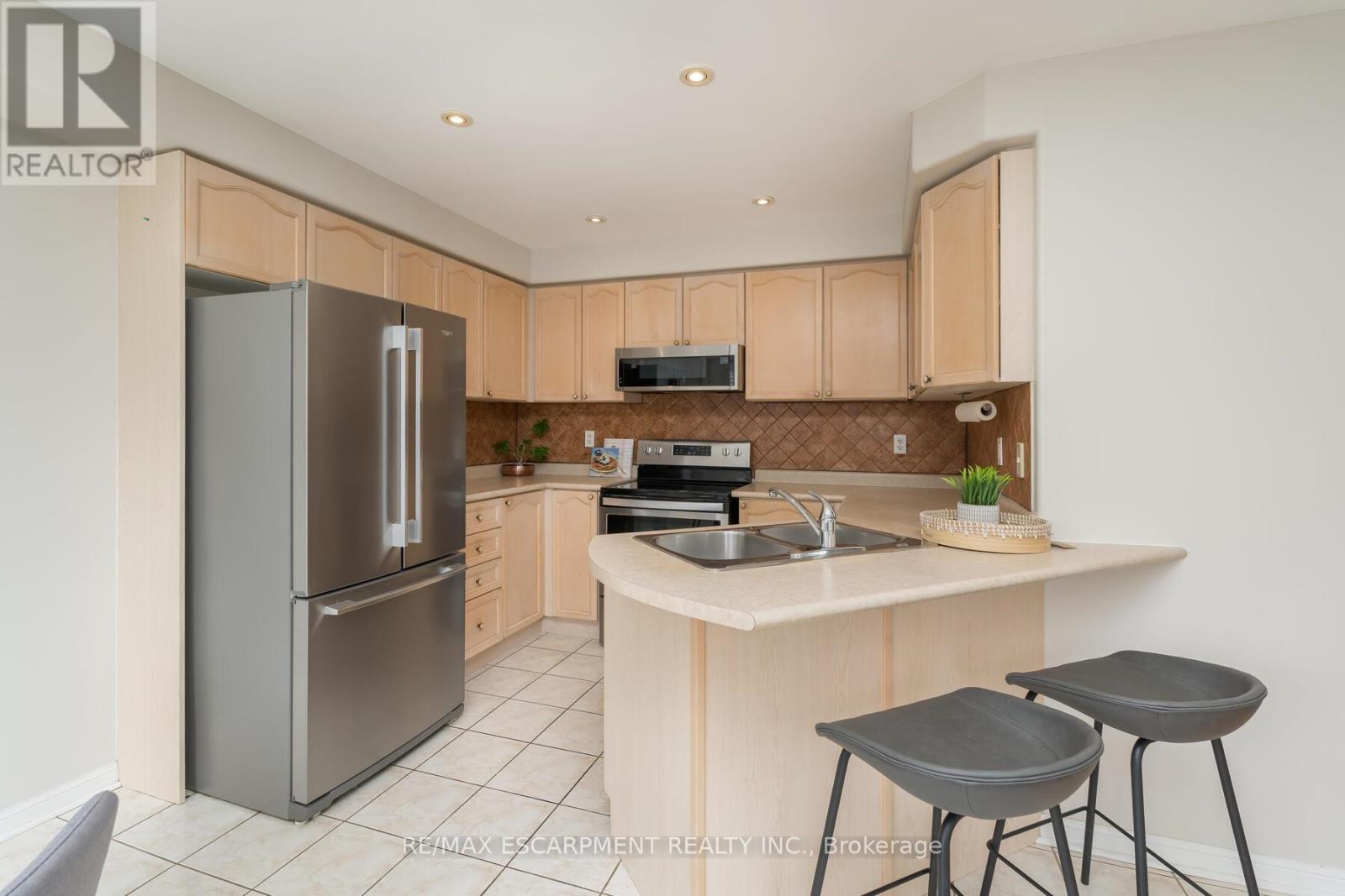 Photo 21 of 673 Bennett Boulevard, Milton ON