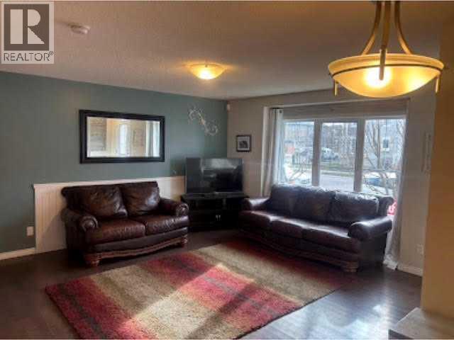 Photo 3 of 3136 Windsong Boulevard Sw, Airdrie AB