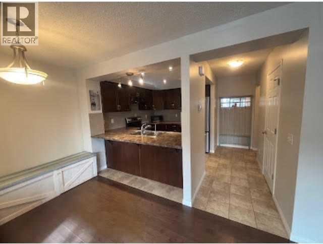 Photo 7 of 3136 Windsong Boulevard Sw, Airdrie AB