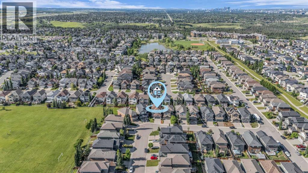 Single Family House for Sale in  Everhollow Green SW Evergreen Calgary 