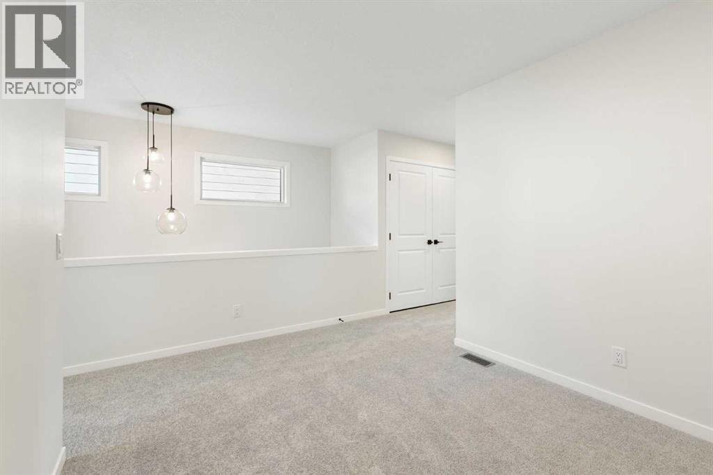 Photo 23 of 580 Rowmont Boulevard Nw, Calgary AB