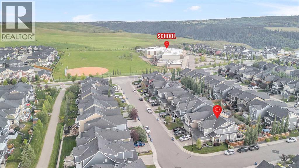 Photo 45 of 100 Sundown Grove, Cochrane AB