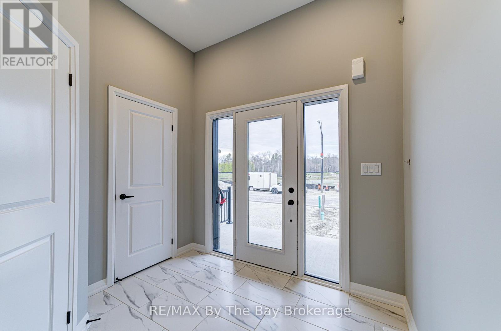 Photo 3 of 61 Federica Crescent, Wasaga Beach ON
