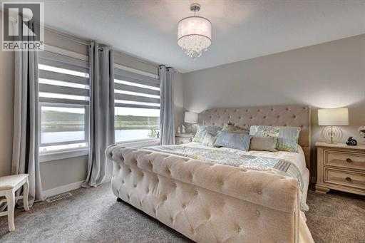 Photo 12 of 144 Cranbrook Gardens Se, Calgary AB