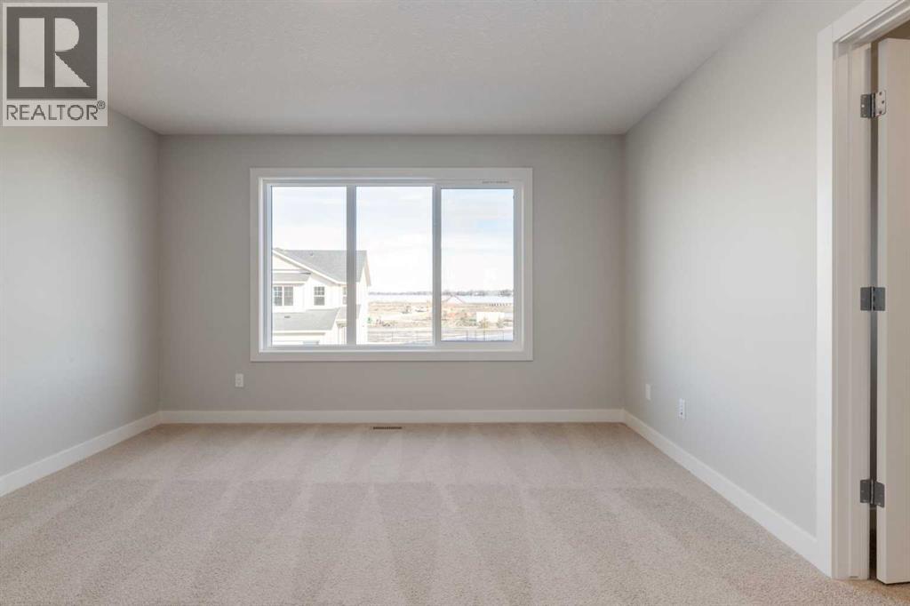 Photo 25 of 207 South Shore Court, Chestermere AB