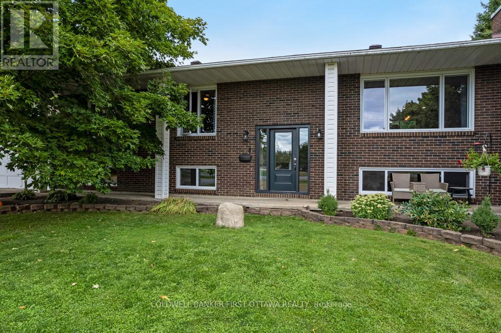 Welcoming all brick home; new front door & windows