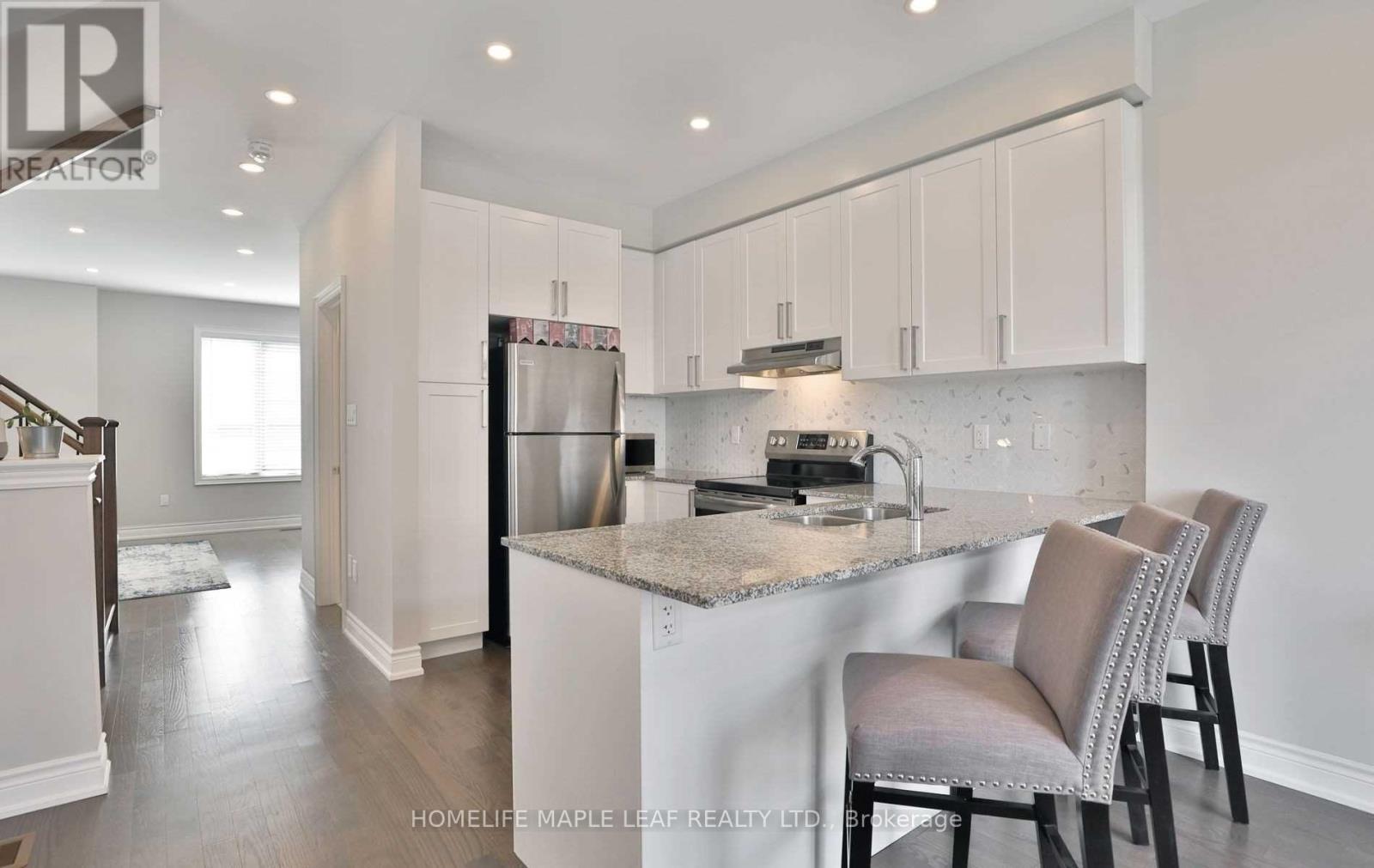 Photo 15 of 34 Brushwood Drive, Brampton ON