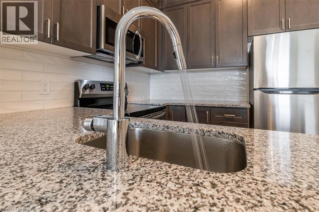 Photo 22 of 95 Dundas Street W Unit 404, Oakville ON