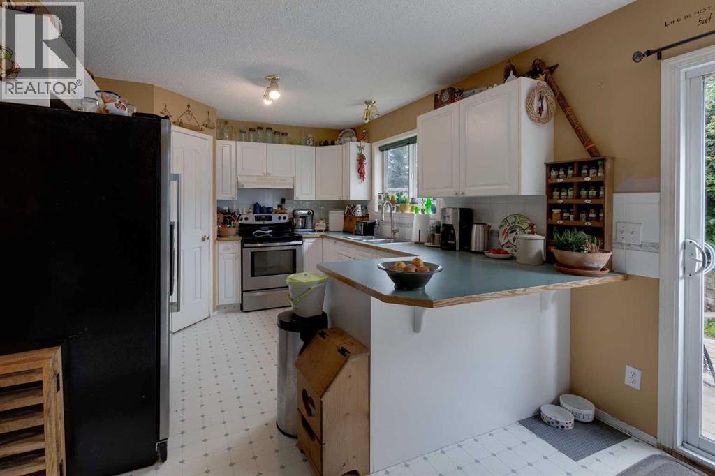 Photo 13 of 234 Quigley Drive, Cochrane AB