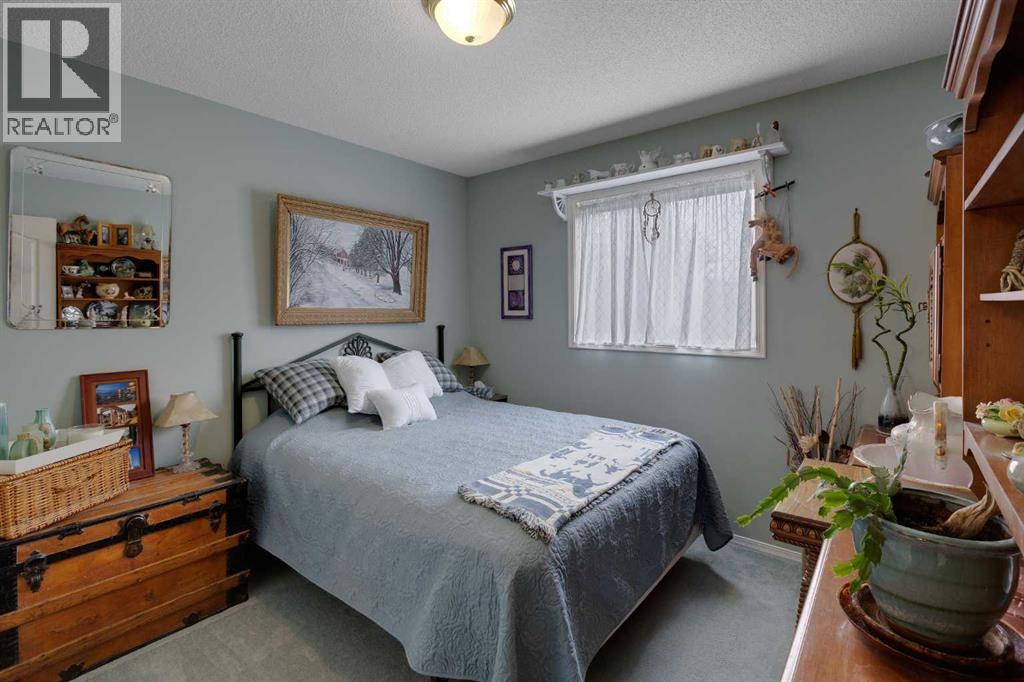 Photo 23 of 234 Quigley Drive, Cochrane AB