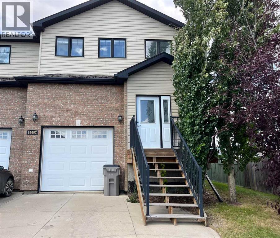 Photo 1 of 11402 82 Avenue, Grande Prairie AB