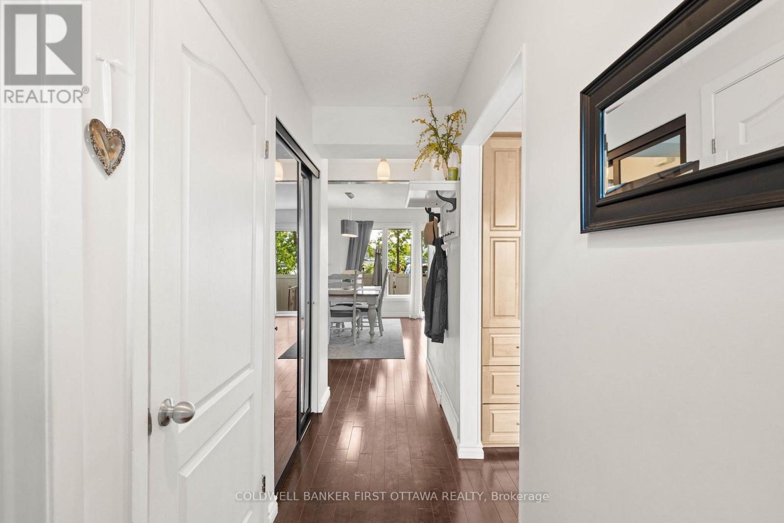 Hallway access to basement & front hall closet.