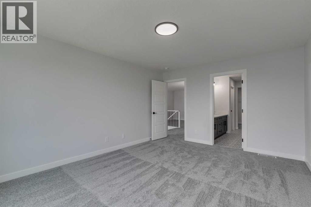 Photo 34 of 76 Amblefield Grove Nw, Calgary AB