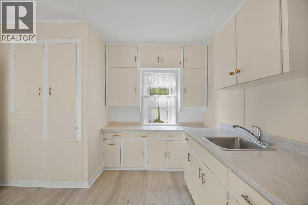 Photo 2 of 5812 52 Avenue, Red Deer AB