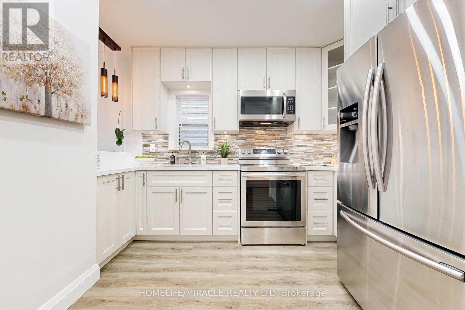Photo 12 of 590 Jones Avenue Avenue, Toronto ON