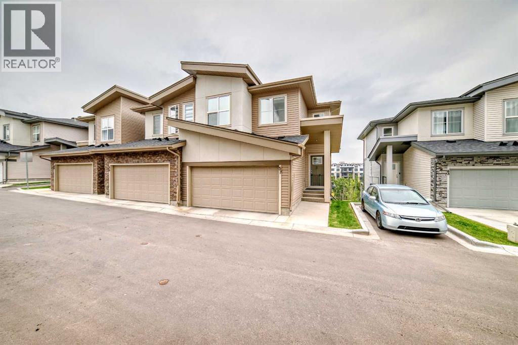 Photo 1 of 57 Spring Creek Common Sw, Calgary AB