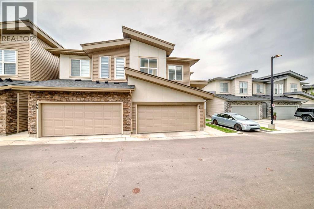 Photo 3 of 57 Spring Creek Common Sw, Calgary AB