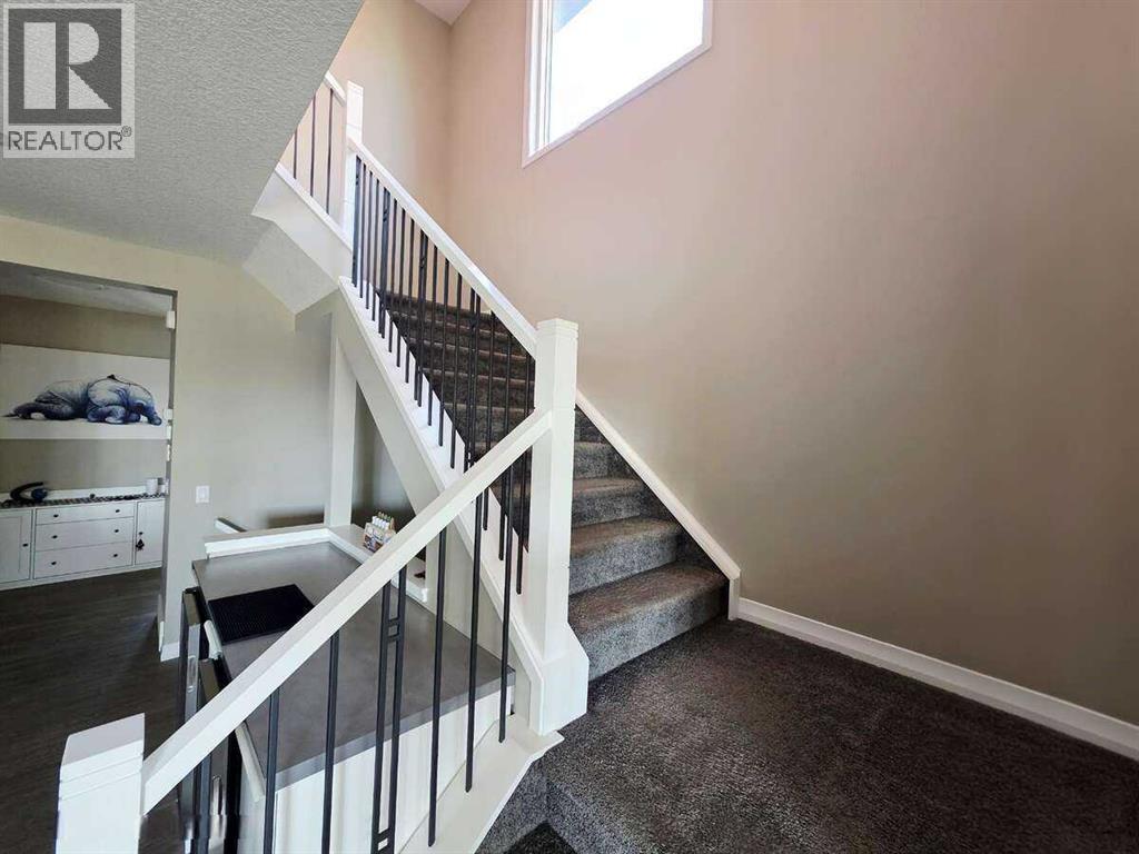 Photo 21 of 238 Kingfisher Crescent Se, Airdrie AB