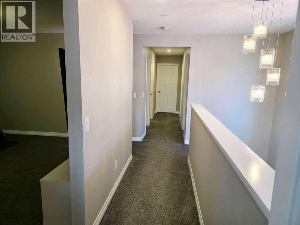 Photo 22 of 238 Kingfisher Crescent Se, Airdrie AB
