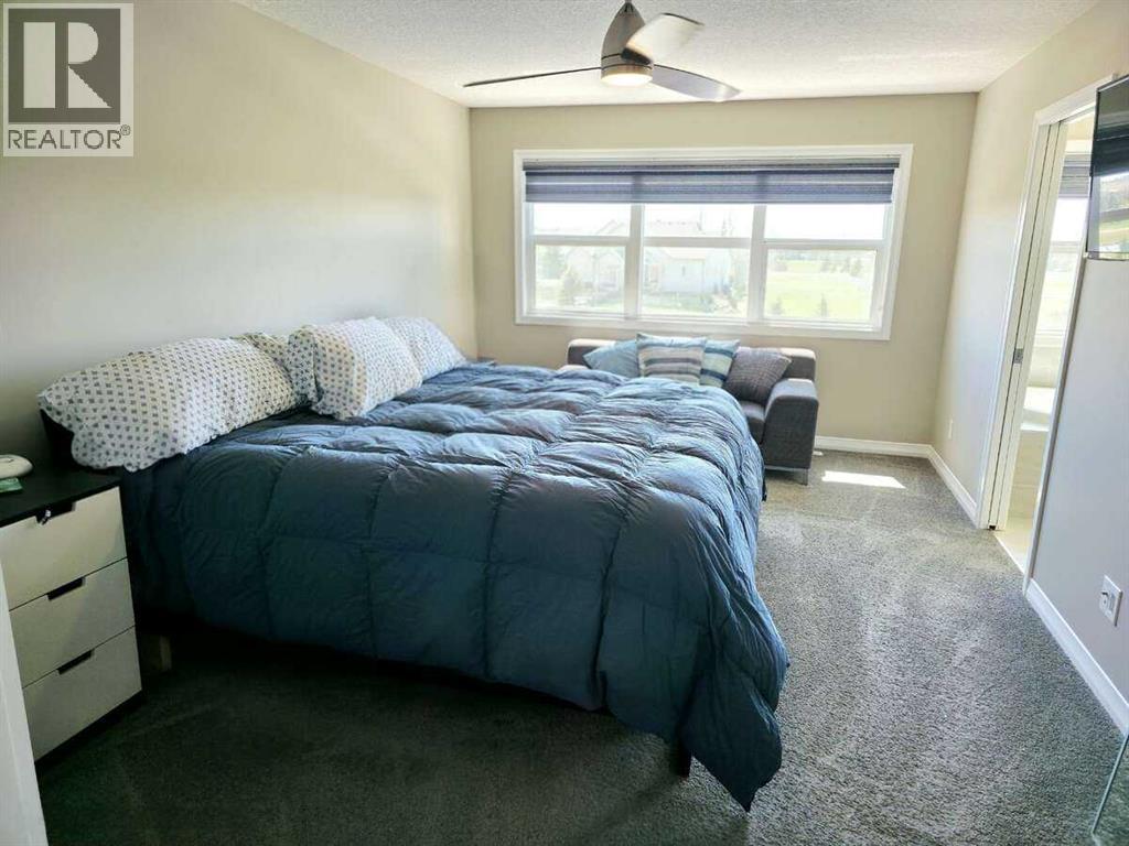 Photo 30 of 238 Kingfisher Crescent Se, Airdrie AB