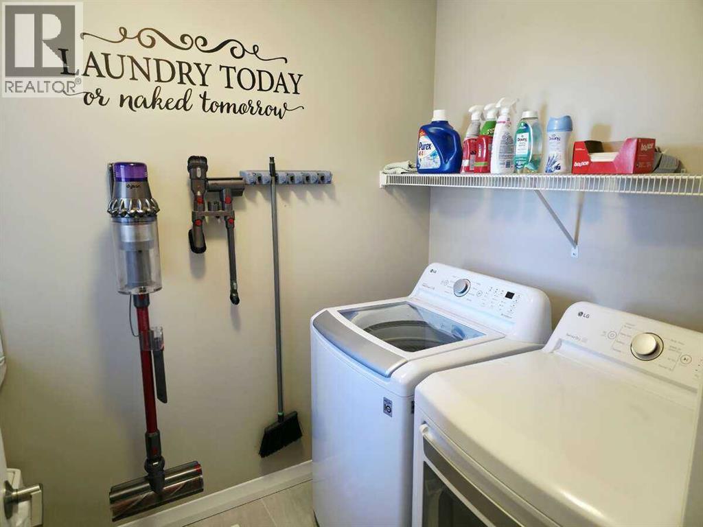 Photo 24 of 238 Kingfisher Crescent Se, Airdrie AB