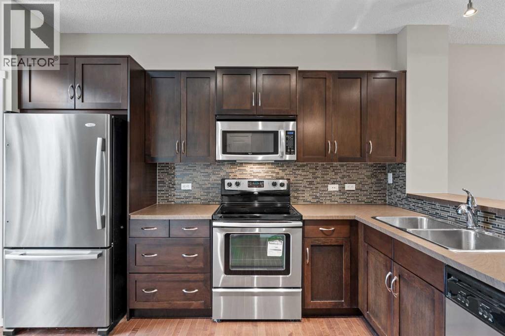Photo 12 of 1212 125 Panatella Way Nw, Calgary AB