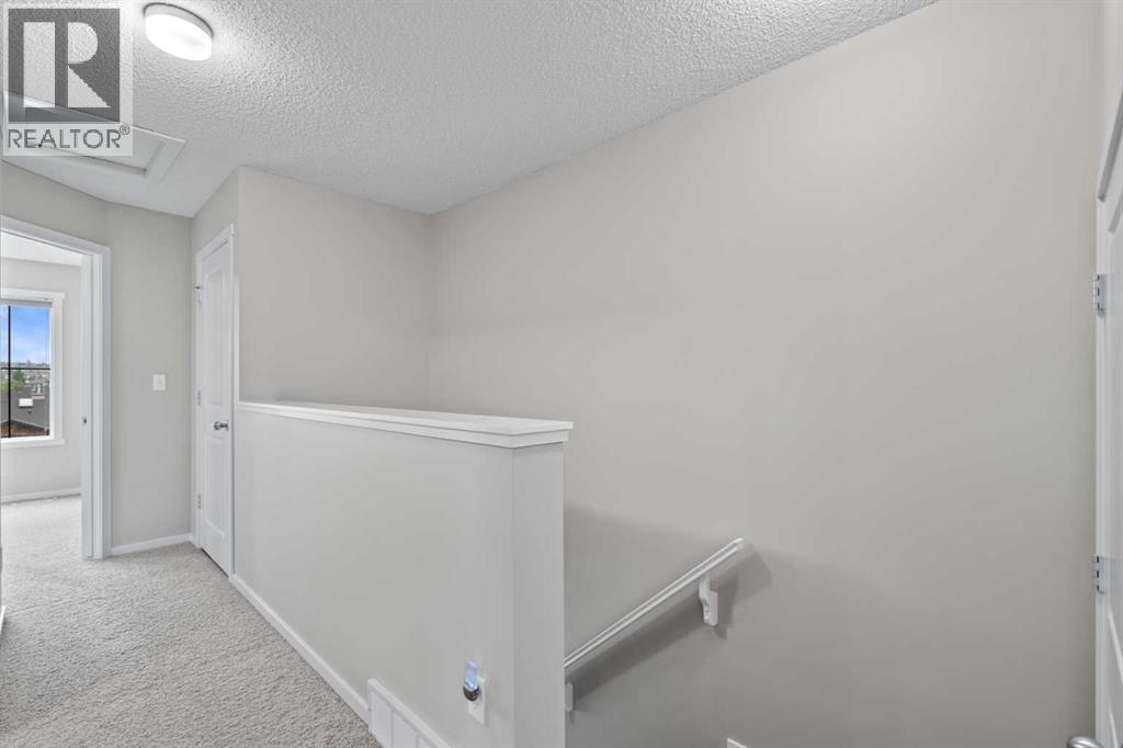 Photo 19 of 1212 125 Panatella Way Nw, Calgary AB
