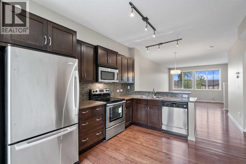 Photo 11 of 1212 125 Panatella Way Nw, Calgary AB