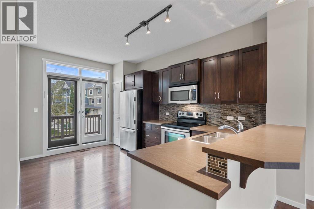 Photo 13 of 1212 125 Panatella Way Nw, Calgary AB