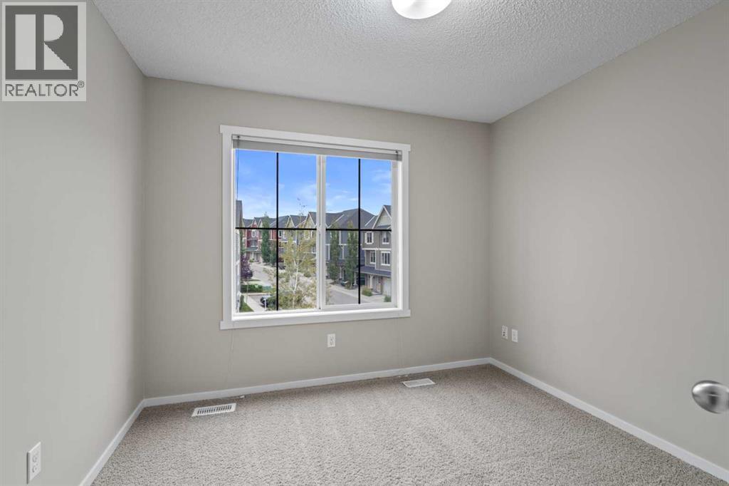 Photo 27 of 1212 125 Panatella Way Nw, Calgary AB