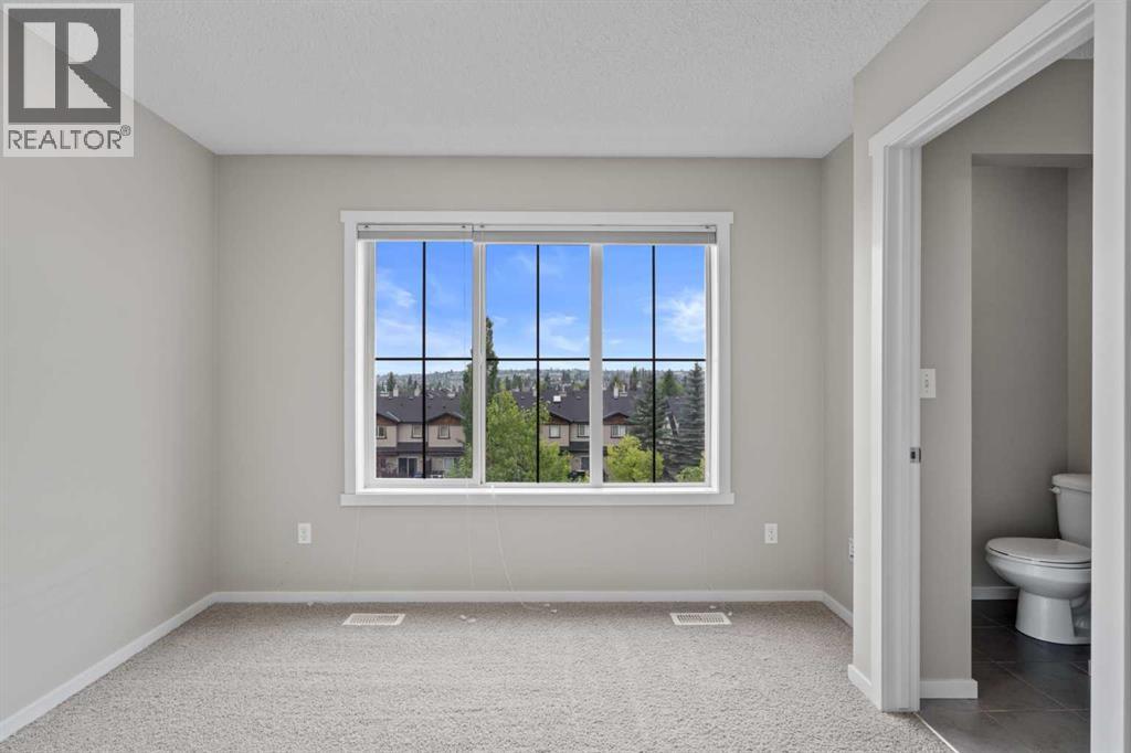 Photo 21 of 1212 125 Panatella Way Nw, Calgary AB