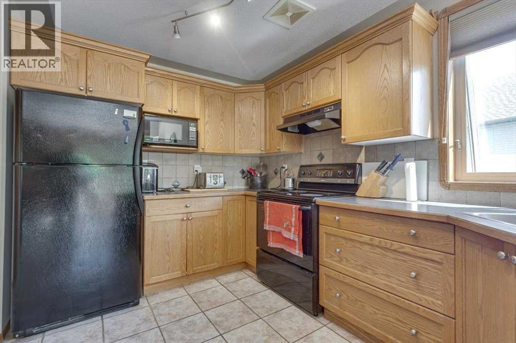 Photo 9 of 301 Addington Drive, Red Deer AB