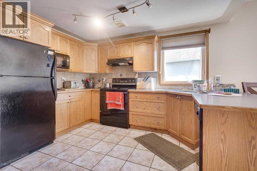 Photo 7 of 301 Addington Drive, Red Deer AB