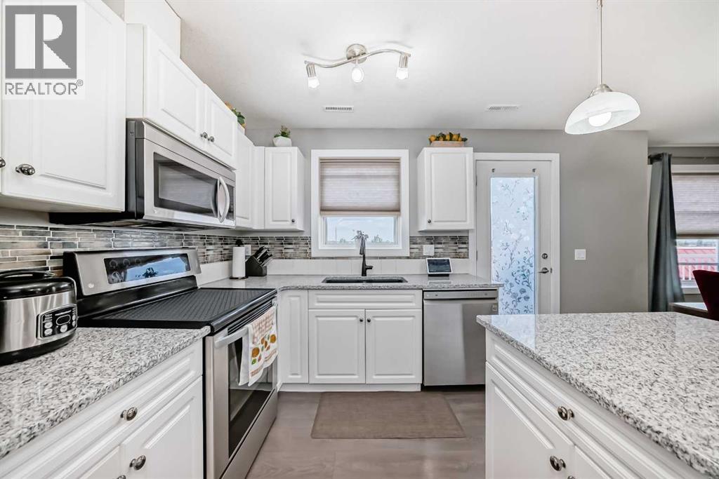 Photo 6 of 302 50 Westland Road, Okotoks AB