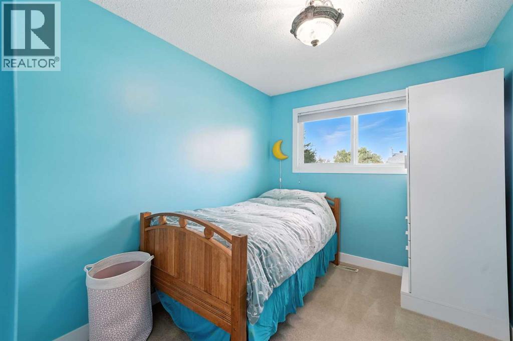Photo 13 of 1454 Hunterbrook Road Nw, Calgary AB
