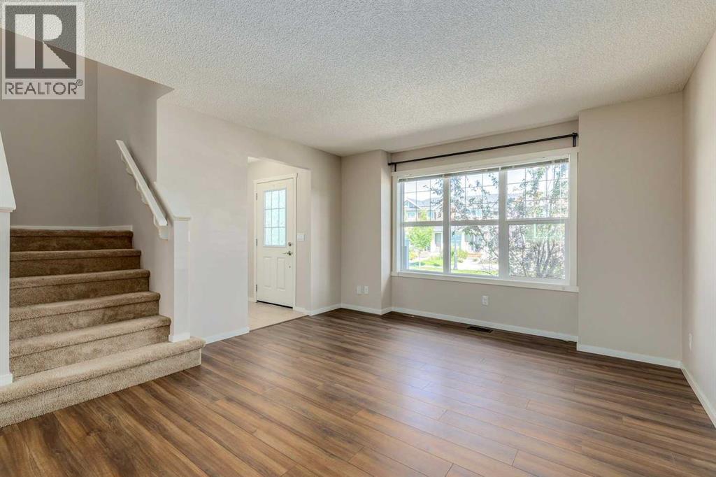 Photo 8 of 44 Sunvalley Road, Cochrane AB
