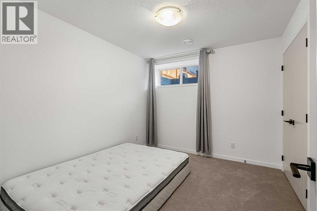 Photo 32 of 520 Belmont Heath Sw, Calgary AB