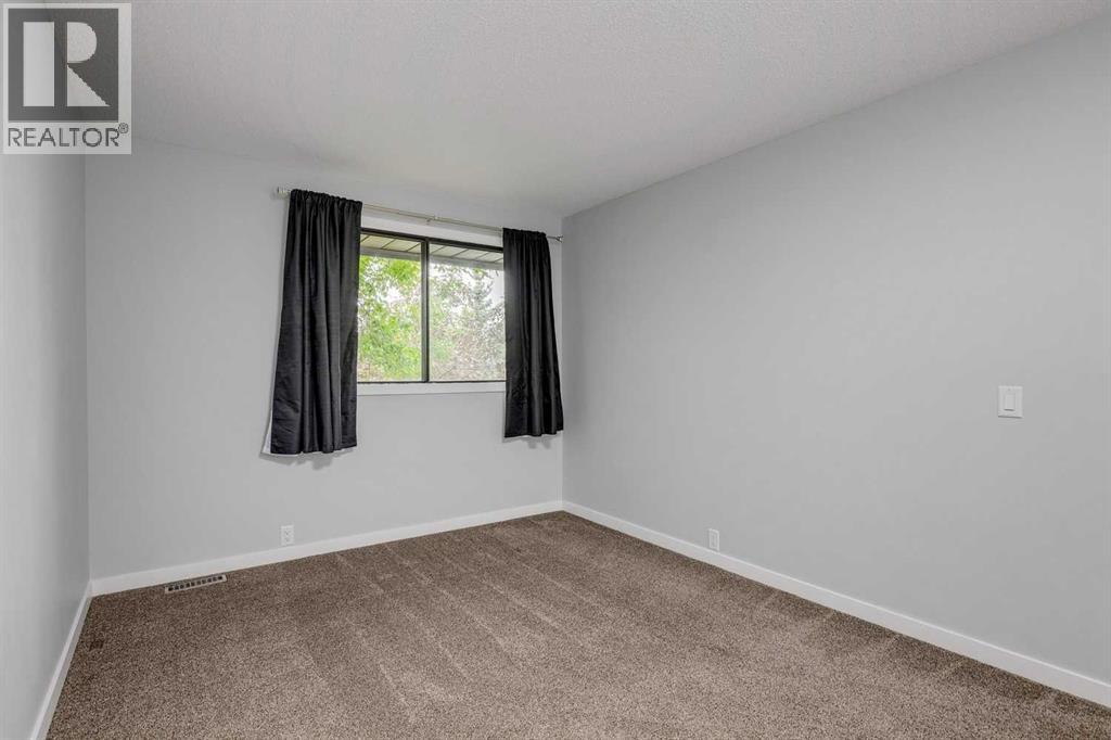 Photo 28 of 701 4935 Dalton Drive Nw, Calgary AB