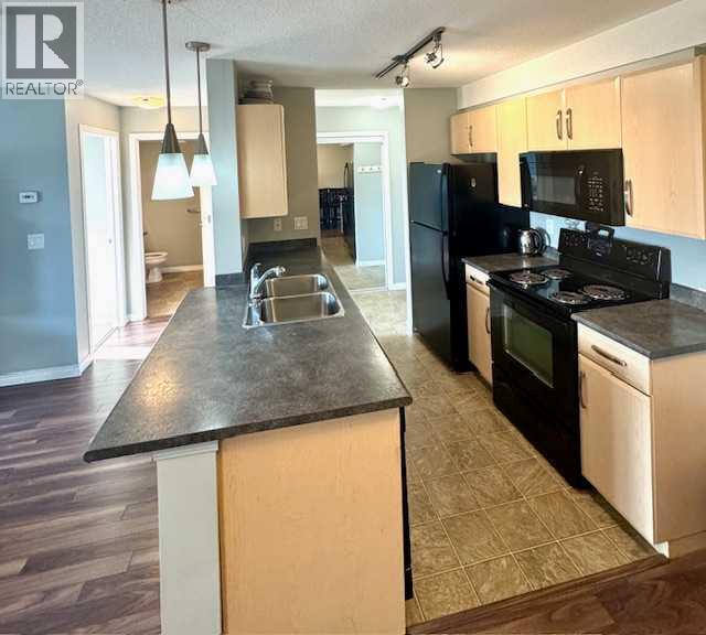 Photo 4 of 103 9124 96 Avenue, Grande Prairie AB