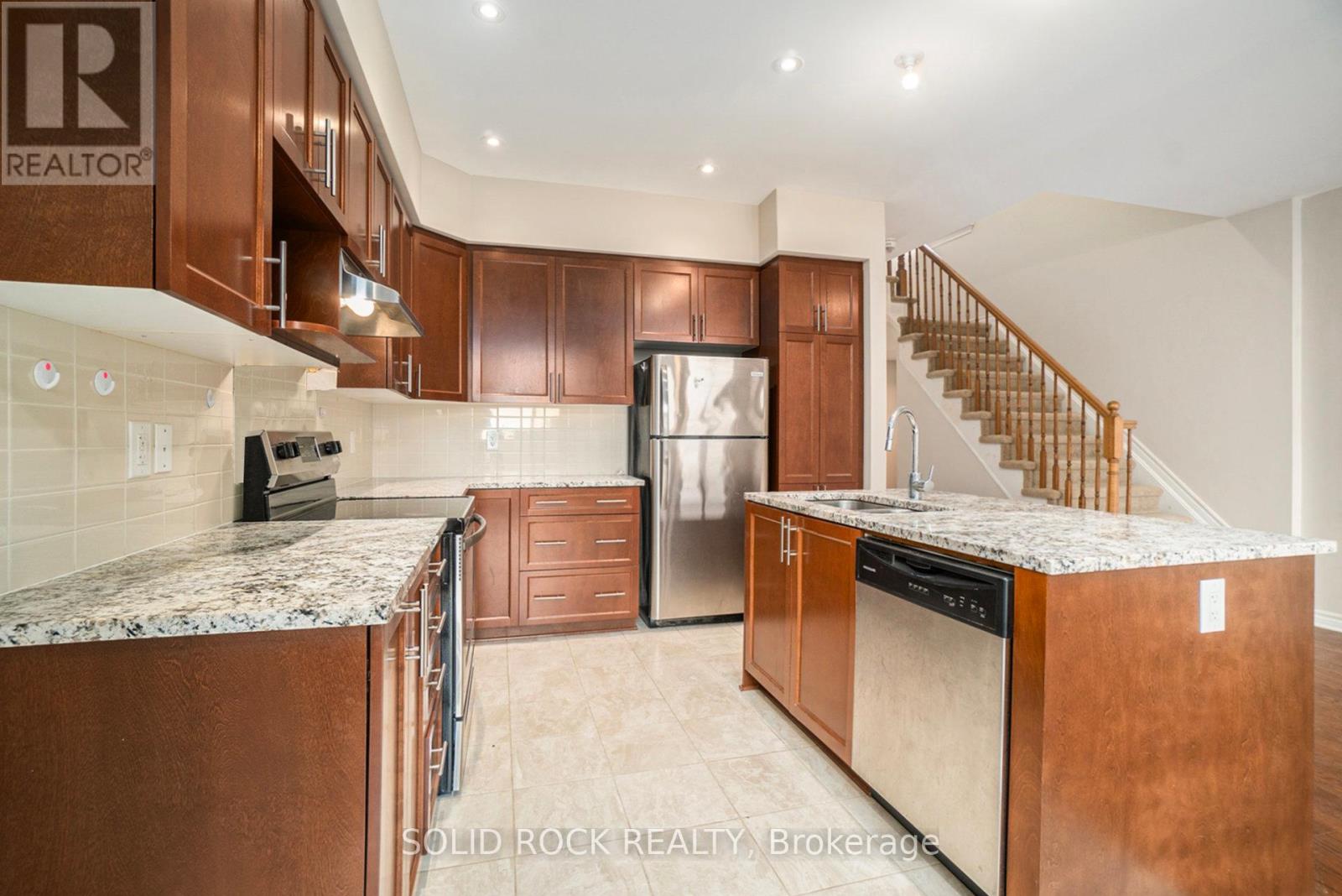 Open concept kitchen with dishwasher