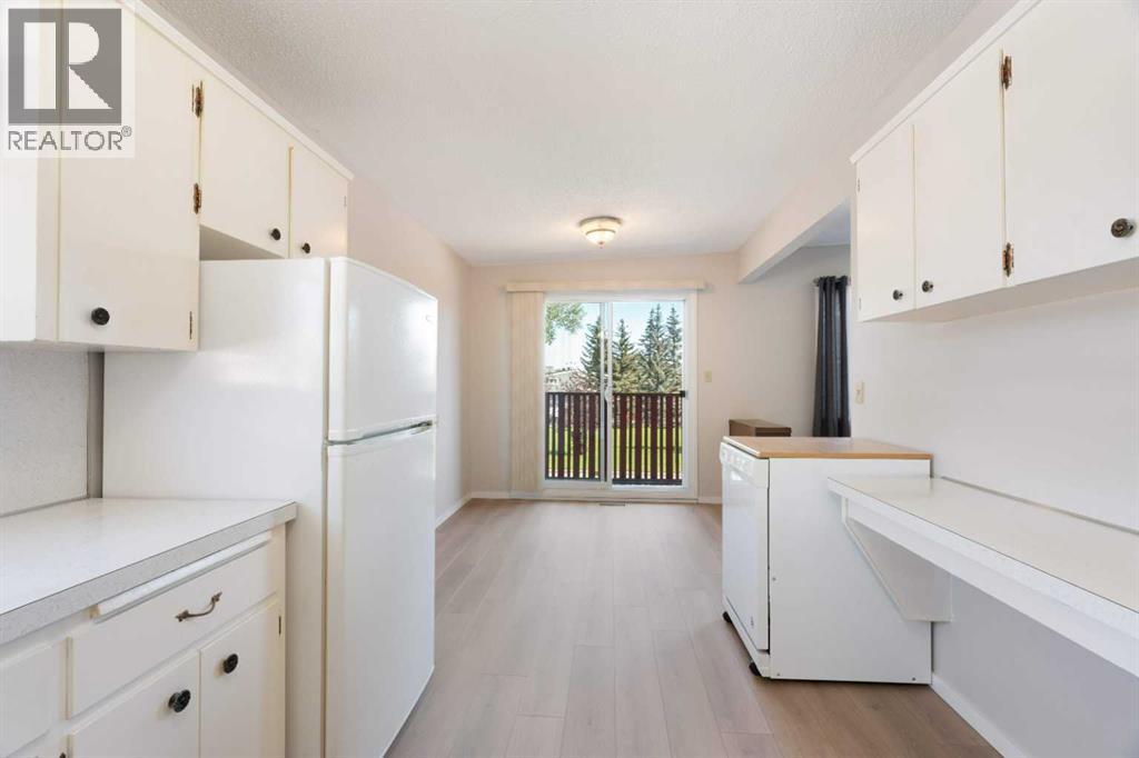 Photo 6 of 11741 Canfield Road Sw, Calgary AB