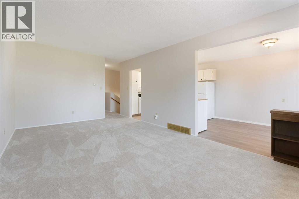 Photo 2 of 11741 Canfield Road Sw, Calgary AB