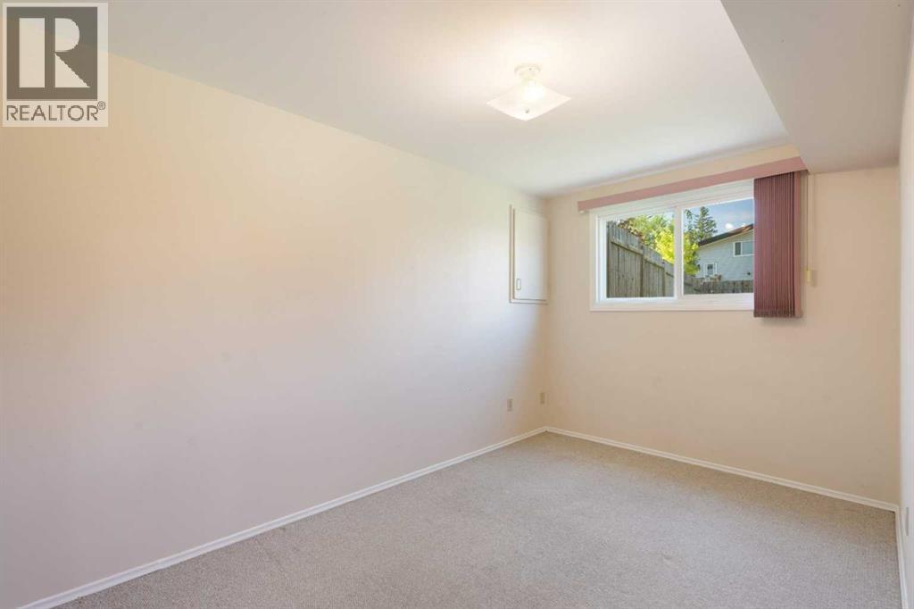 Photo 17 of 11741 Canfield Road Sw, Calgary AB