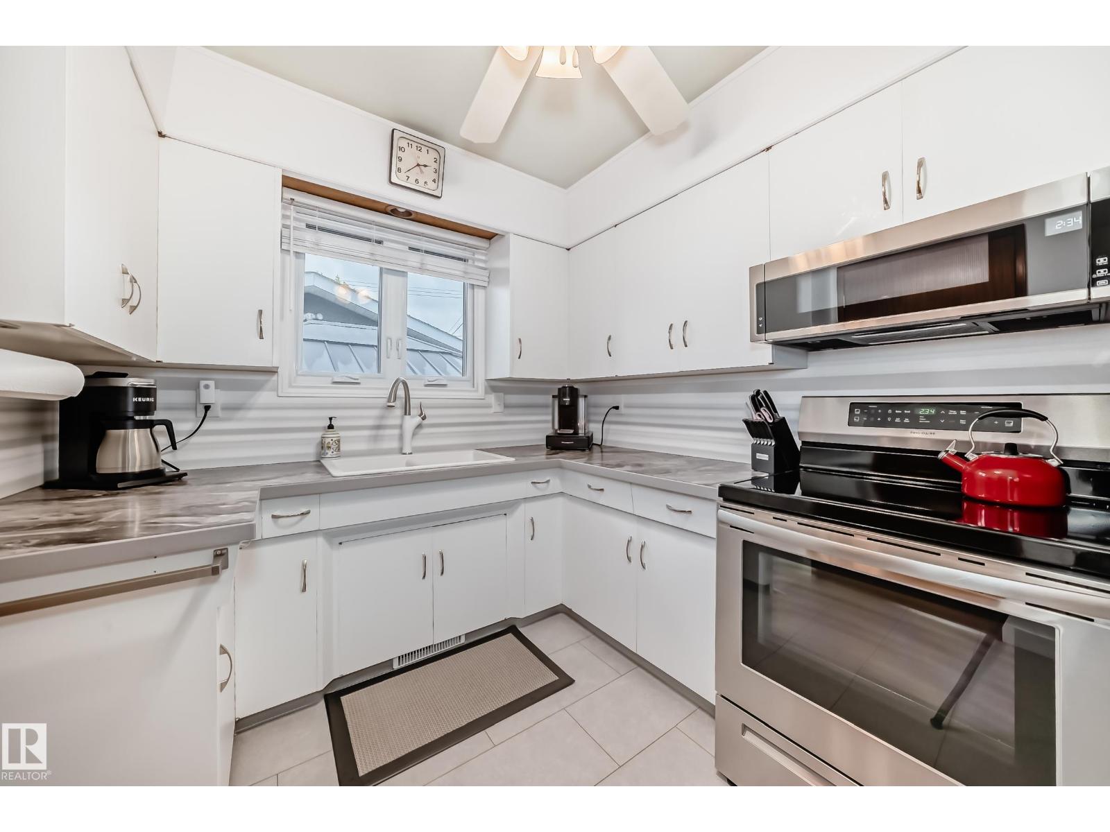 Photo 4 of 7012 132 Av Nw, Edmonton AB