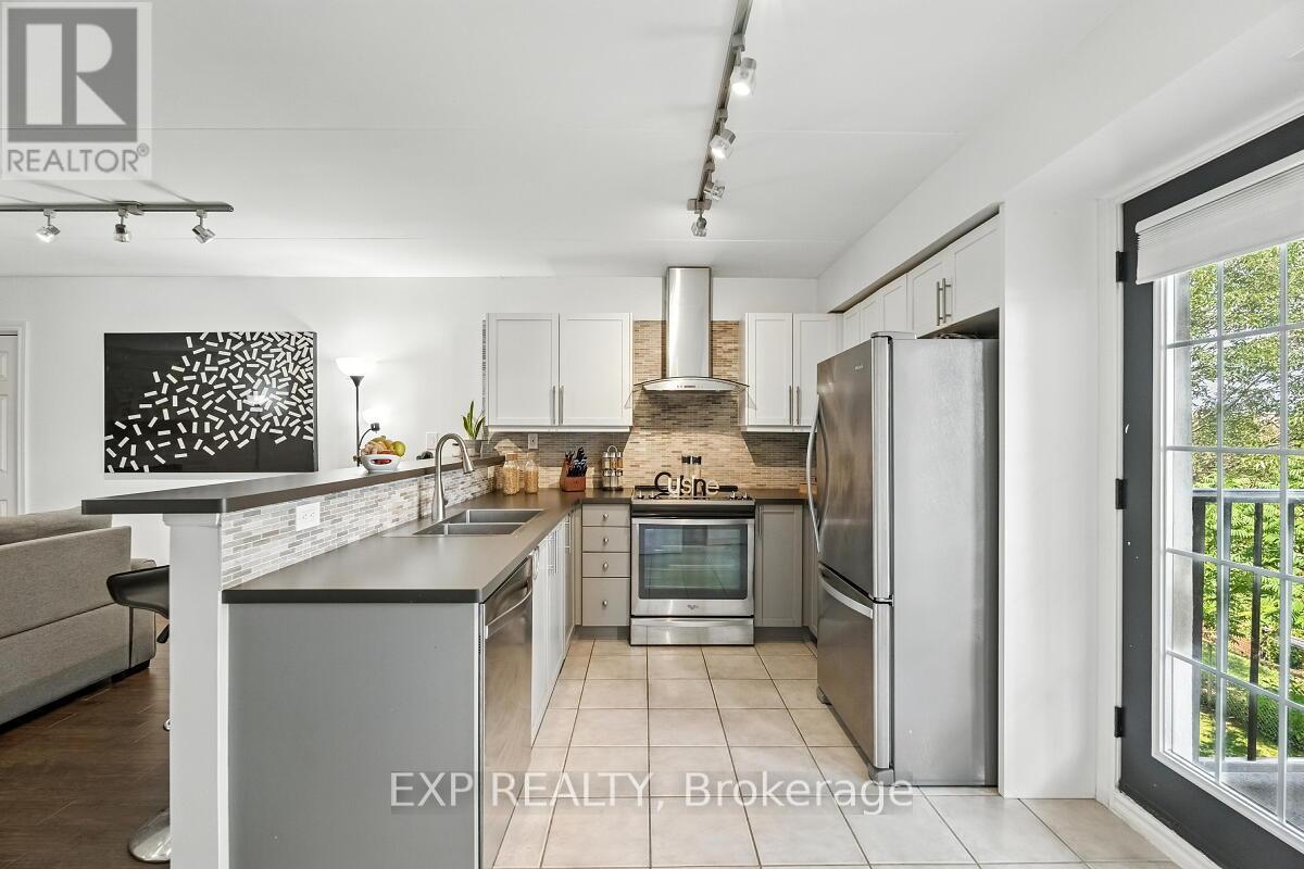 Photo 8 of 215 1421 Walkers Line, Burlington ON