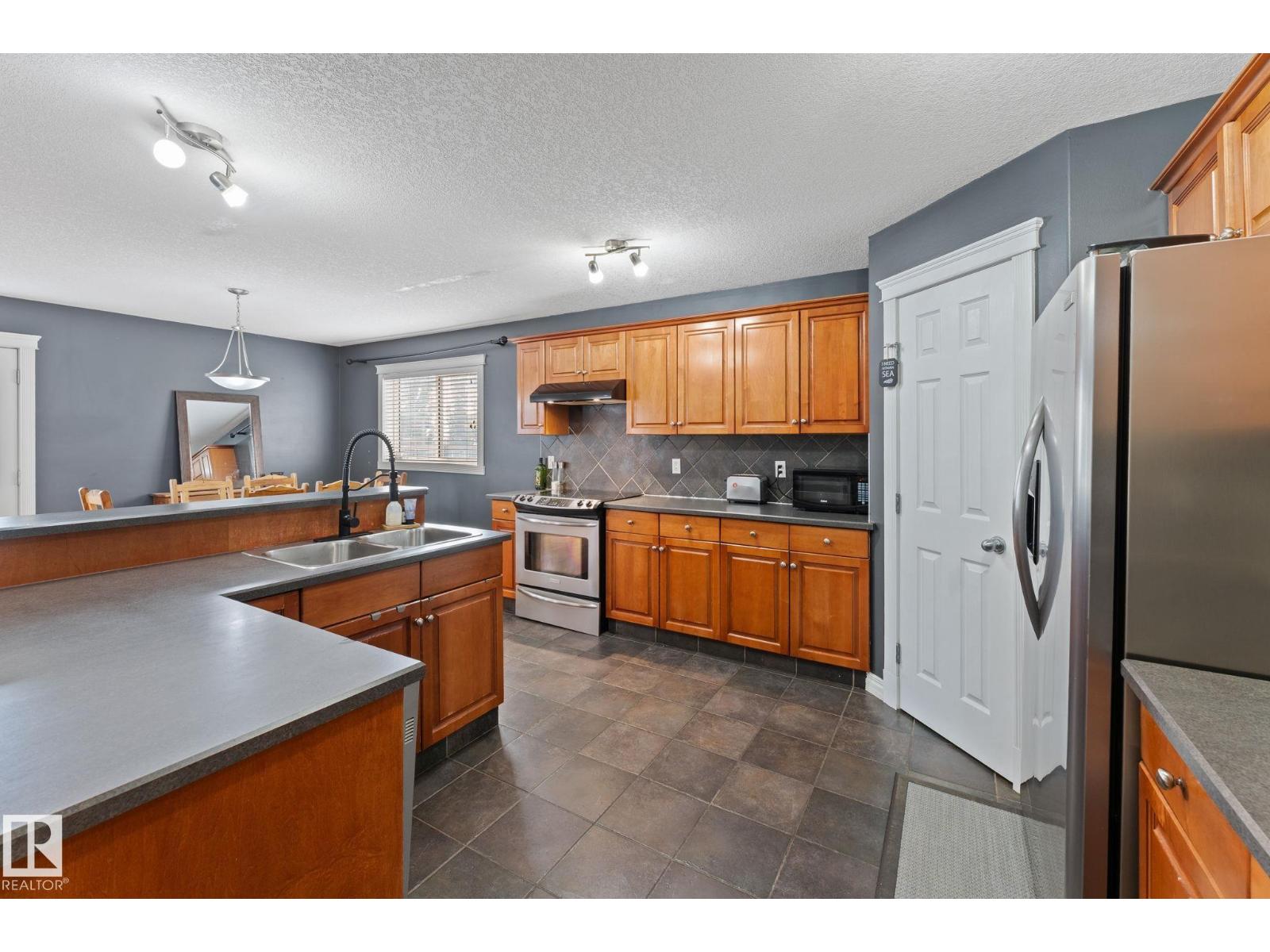 Photo 15 of 7907 96 St, Morinville AB