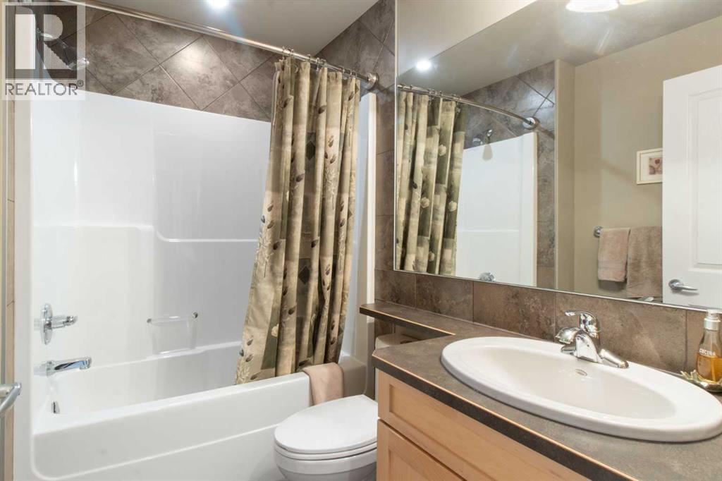 Photo 22 of 161 Bridlerange Circle Sw, Calgary AB
