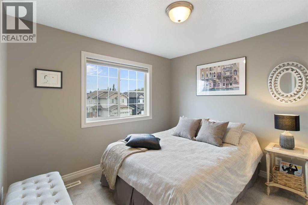 Photo 23 of 161 Bridlerange Circle Sw, Calgary AB