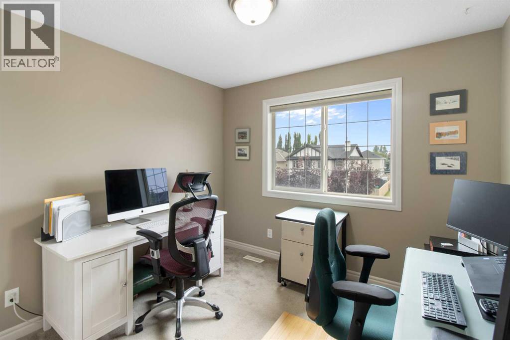 Photo 25 of 161 Bridlerange Circle Sw, Calgary AB