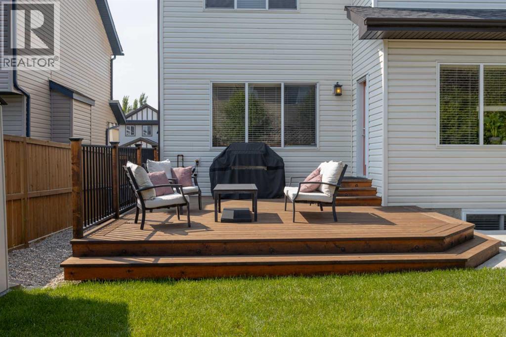 Photo 42 of 161 Bridlerange Circle Sw, Calgary AB